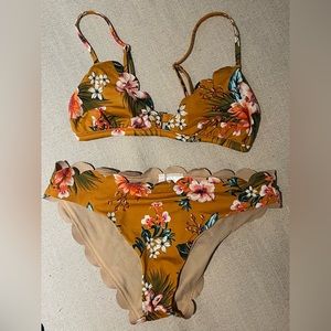 Small bathing suit top with medium bathing suit bottoms